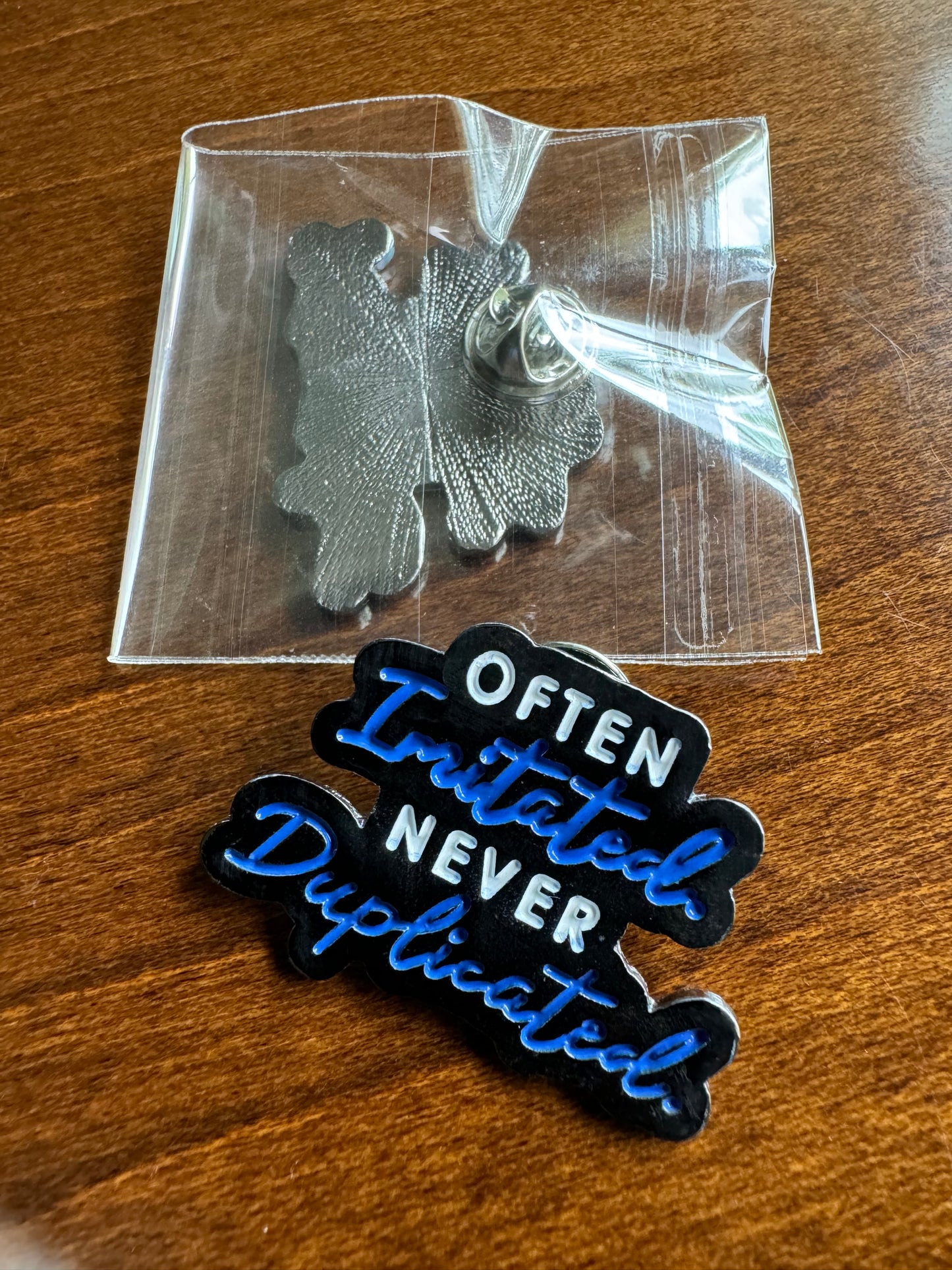 Never Duplicated Lapel Pin