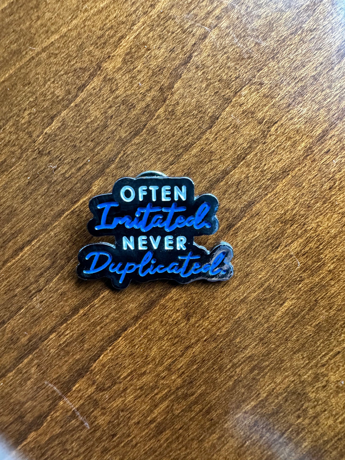 Never Duplicated Lapel Pin