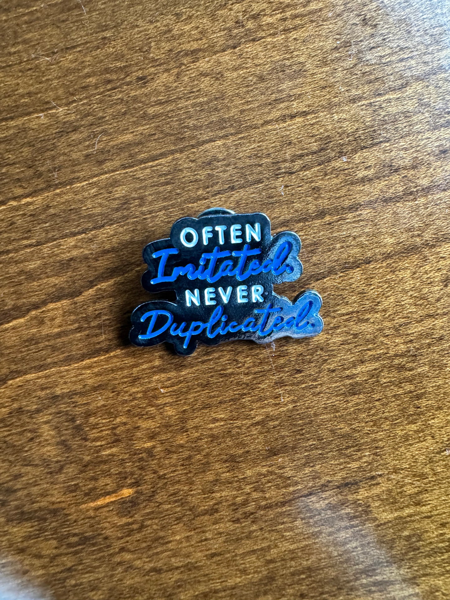 Never Duplicated Lapel Pin