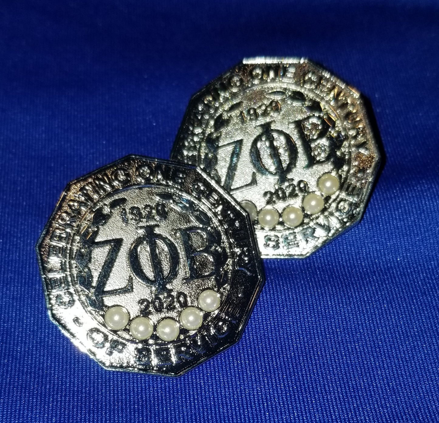 Centennial lapel pin