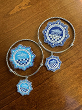 Load image into Gallery viewer, Grand Boule 2024 Pin &amp; Bracelet Set
