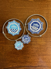 Load image into Gallery viewer, Grand Boule 2024 Pin &amp; Bracelet Set
